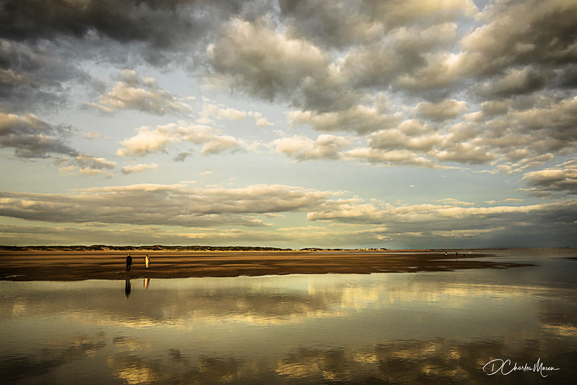 Camber Sands 
 View across Camber sands from Rye Harbour.

From the book: Travels Around Route 259 
 Keywords: camber sands, beach, low tide, Sussex beaches, Sussex, low tide