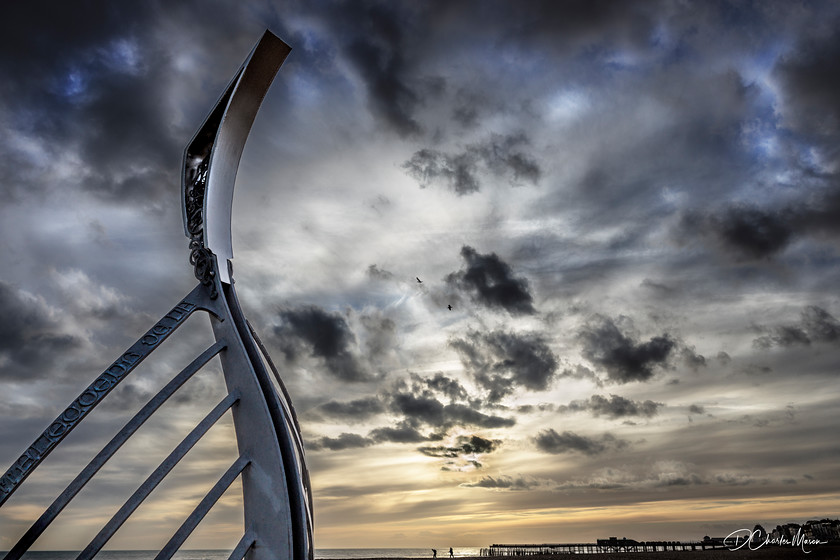 Hastings 
 A sculpture commemorating 1066 provides a foreground interest to the newly saved Hastings Pier in the distance.

From the book: Travels Around Route 259 
 Keywords: Hastings, Hastings pier, Sussex coast, colour,