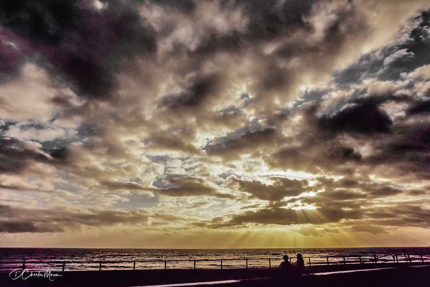 Sunset on the Next-Wave 
 Looking South from the Metropole Lawn in Bexhill-on-Sea. 
 Keywords: Bexhill-on-Sea, Bexhill, Bexhill Metropole Lawn, Metropole, moody sky, Sussex, Sussex landscape, Sussex sea view, Bexhill Sea view,